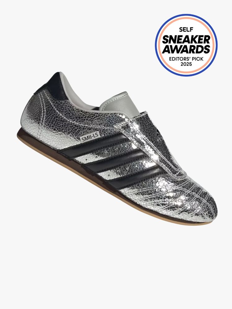 Adidas Taekwondo shoe in silver color way with black stripes. The SELF Sneaker Awards seal is in the top right corner.