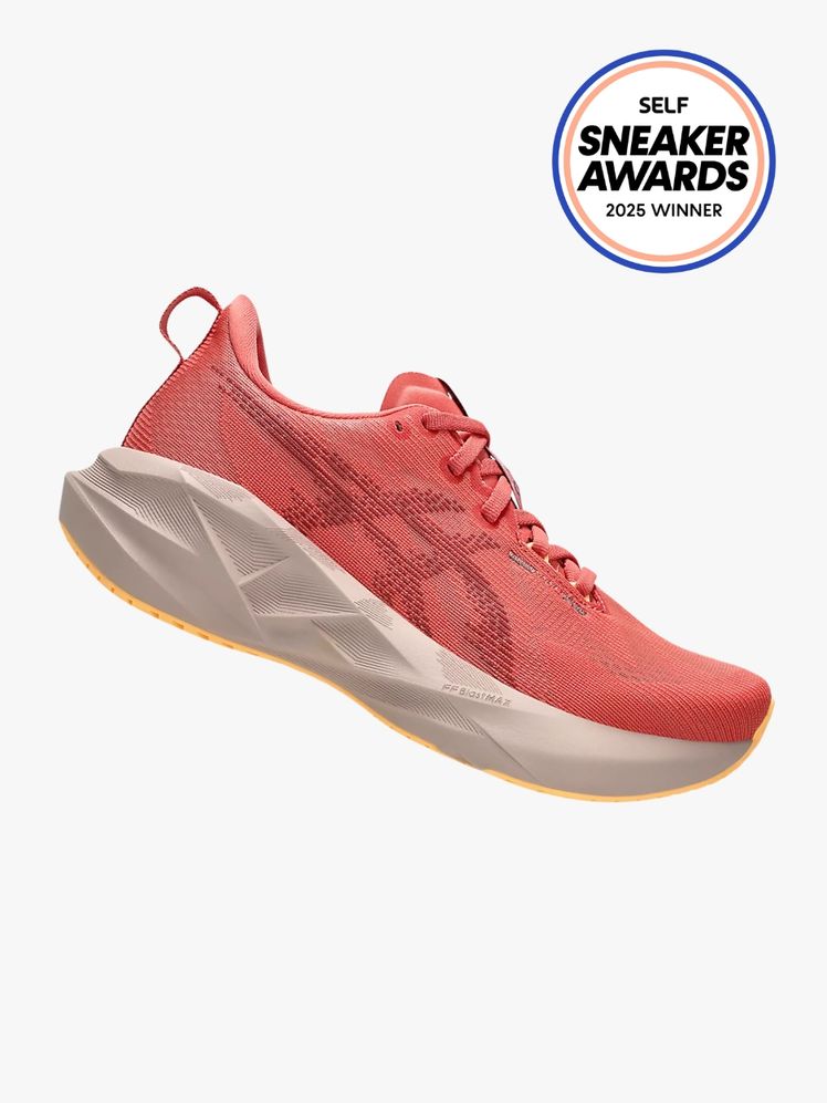 Salmon Asics sneaker with large offwhite sole and brand logo on the side of the shoe. The SELF Sneaker Awards seal is in...