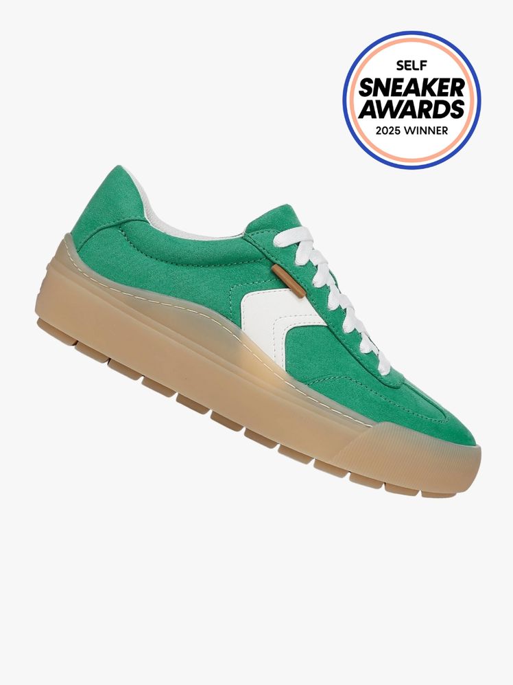 Dr. Scholl's Time Off Win sneaker in a kelly green color way with a gum sole. The SELF Sneaker Awards seal is in the top...