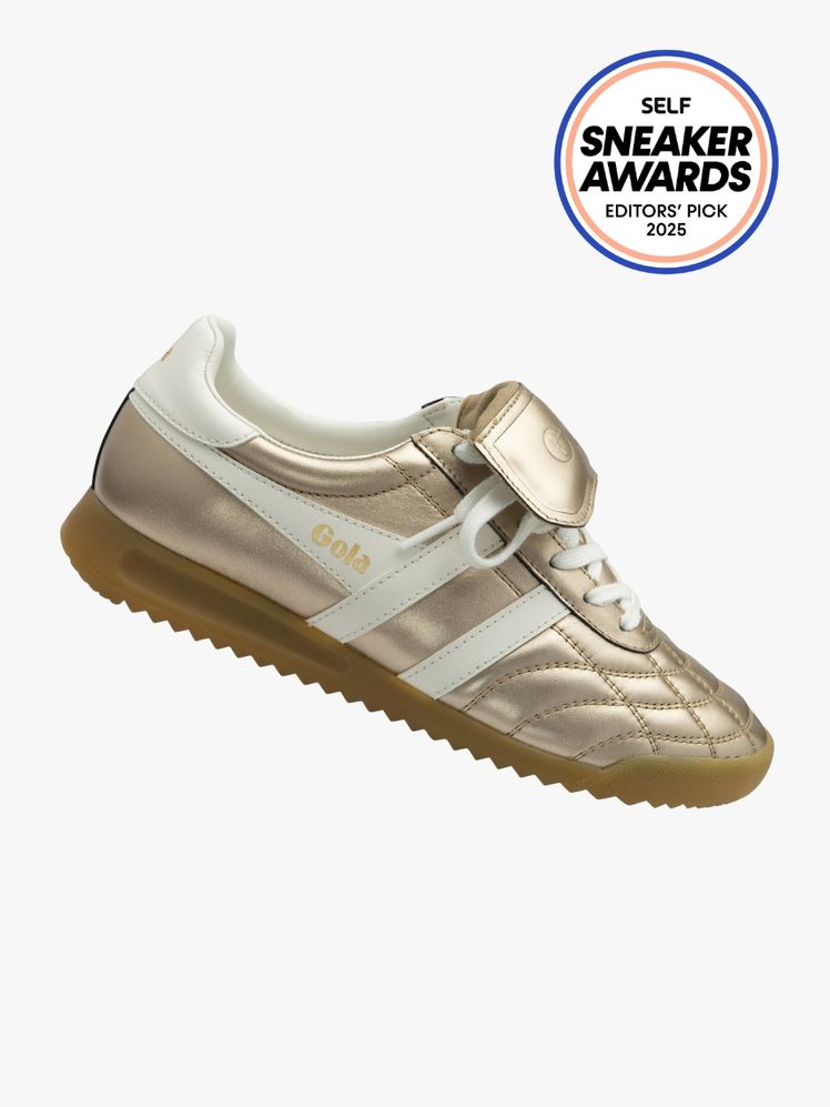 Gola Classics Stadium '86 shoe in gold and white color way. The SELF Sneaker Awards seal is in the top right corner.