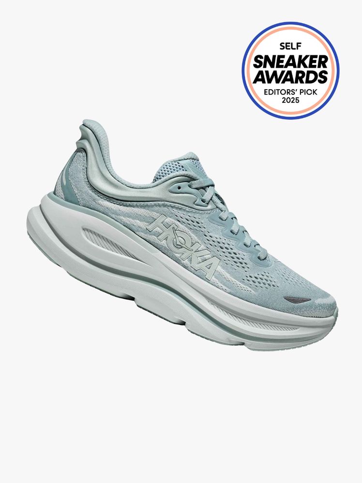 HOKA Bondi 9 sneaker in light blue color way. The SELF Sneaker Awards seal is in the top right corner.