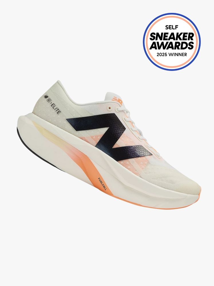 White sneaker with thick cushioned sole and light orange highlights. The SELF Sneaker Awards logo is in the top right...