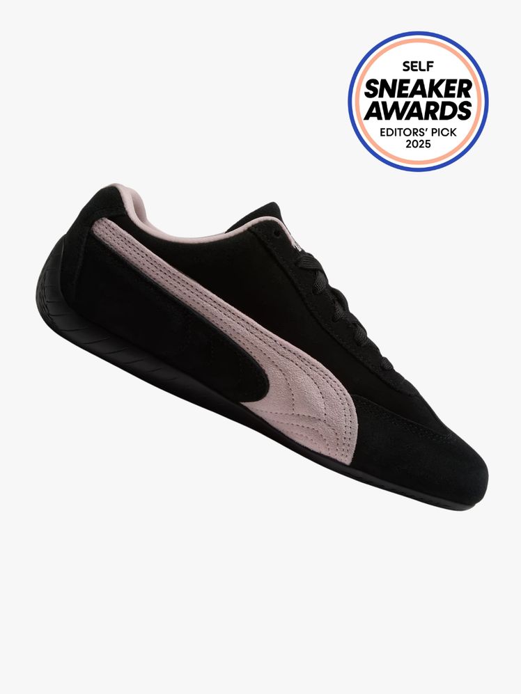 Puma Speedcat OG in black and light pink color way. The SELF Sneaker Awards seal is in the top right corner.