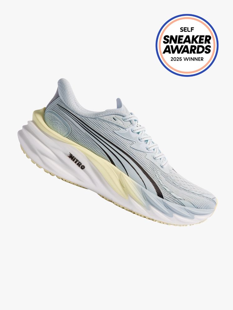 Light blue Puma sneaker with butter yellow and white cushioned Nitro sole. The SELF Sneaker Awards seal is in the top...