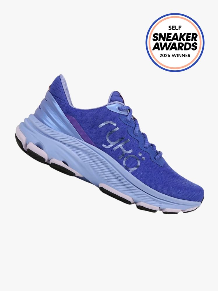 Ryka Devotion X Max Rs sneaker in cobalt color way. The SELF Sneaker Awards seal is in the top right corner.