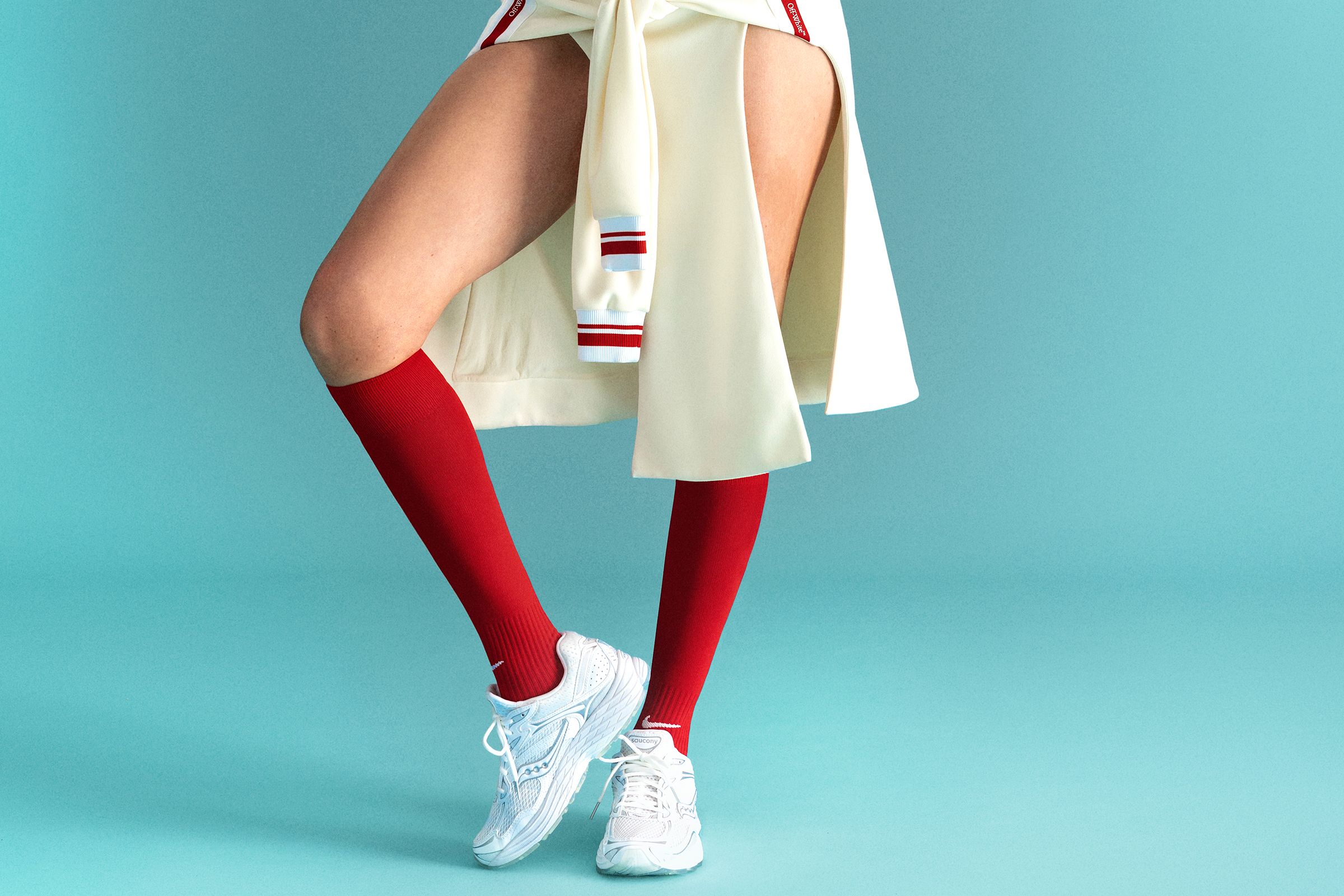 Image may contain: Clothing, Skirt, Miniskirt, Person, Teen, Footwear, and Shoe