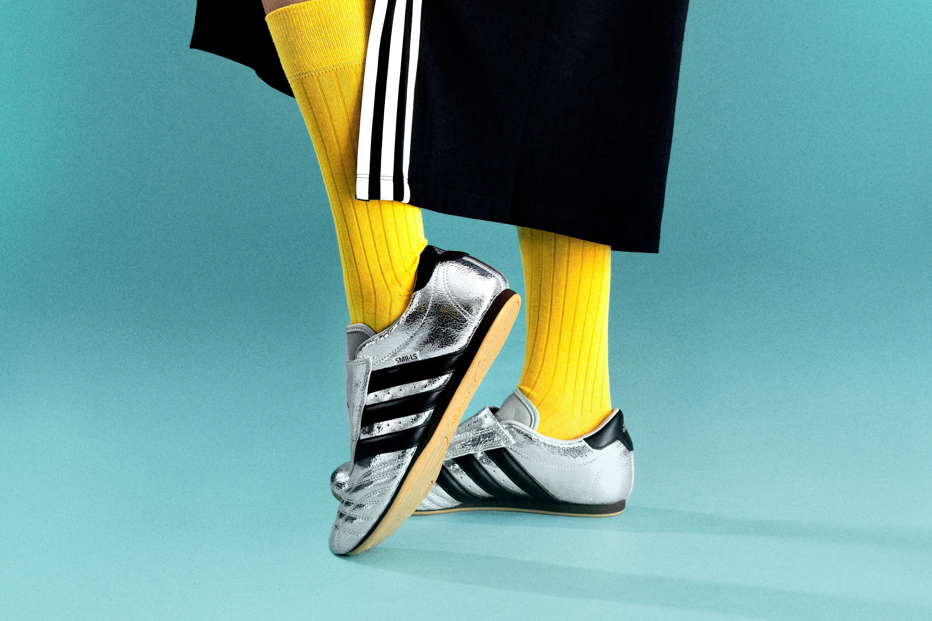 Image may contain: Clothing, Footwear, Shoe, Sneaker, Adult, Person, and High Heel